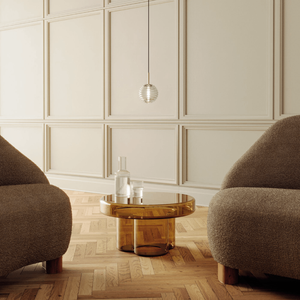 Delicate Ridged Glass Spherical Pendant over a side table in a living room